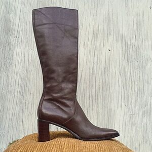 Tall brown leather high heel boots